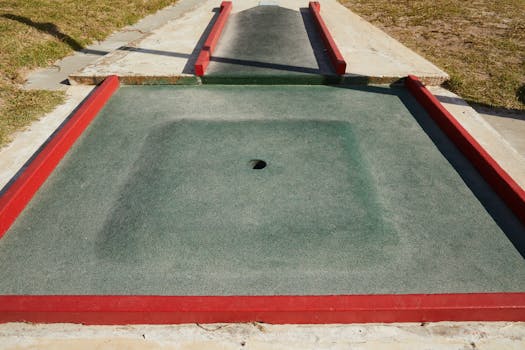 Goldendoodle completing an obstacle course