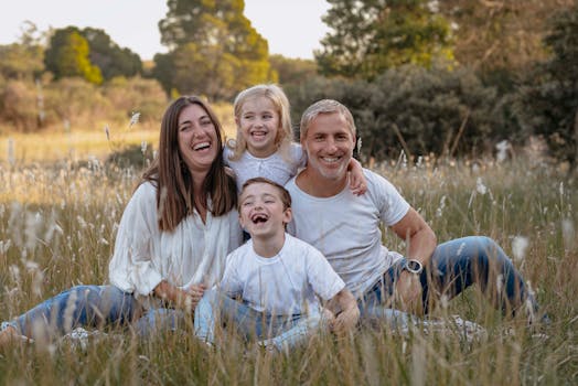 happy family with their Goldendoodle