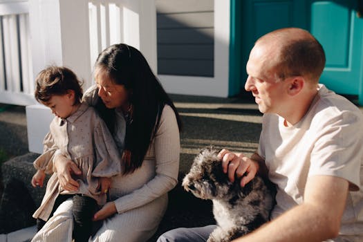 happy family with their pet doodle